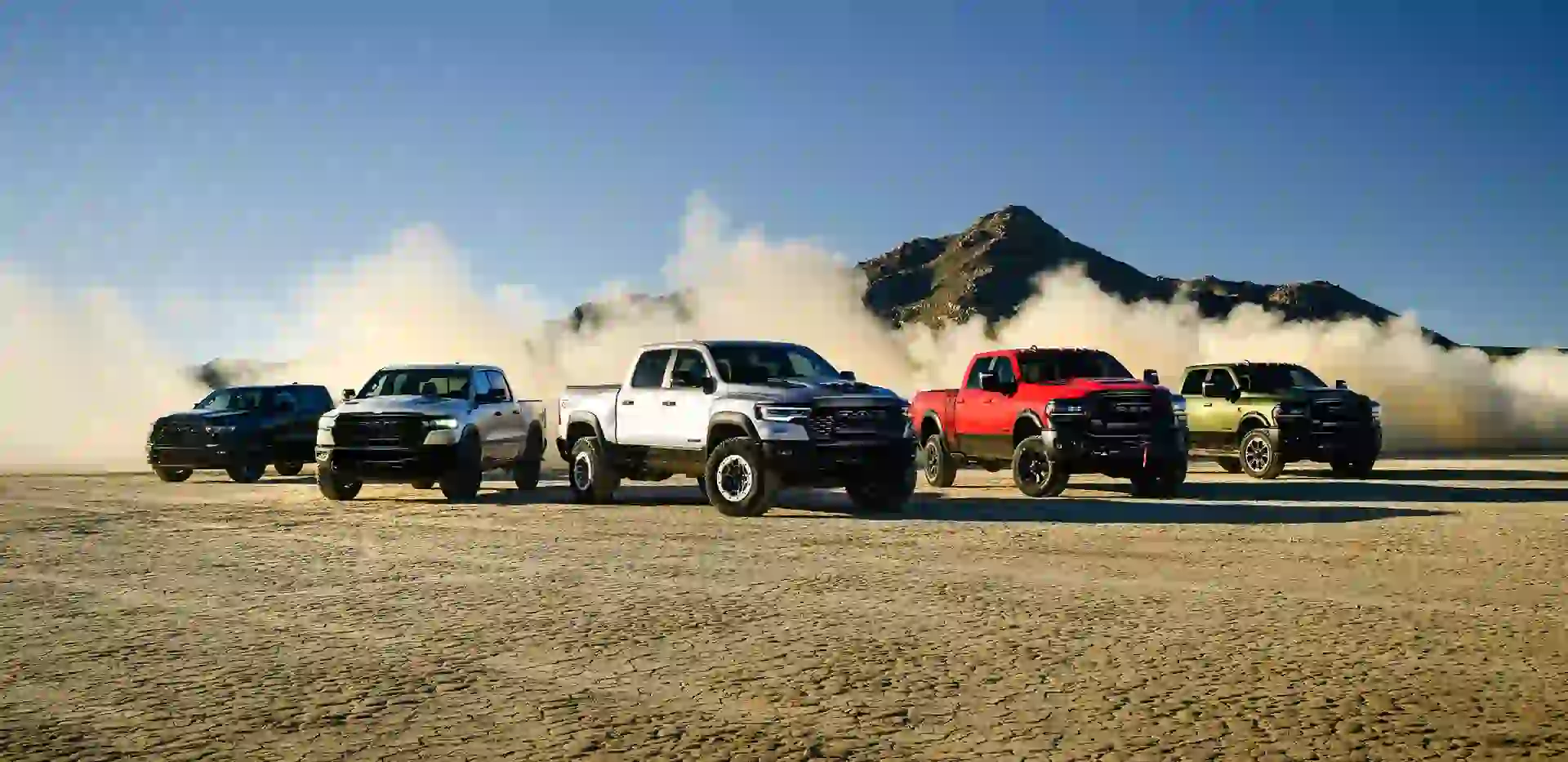 Gray 2026 Ram 1500 driving off-road
